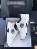C white & black trainers